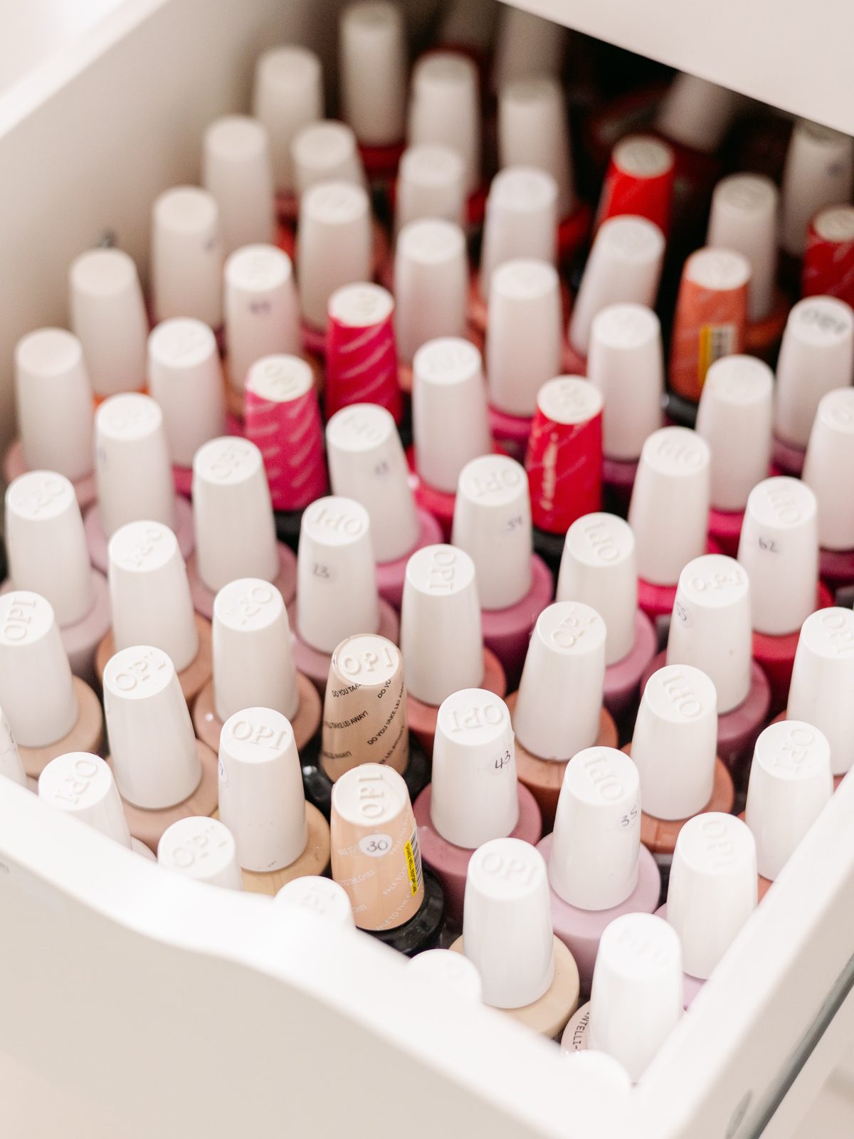 A drawer of gel polish colours